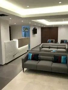 Reception and waiting area at José Cortés Institute, modern clinic interior in Mexico