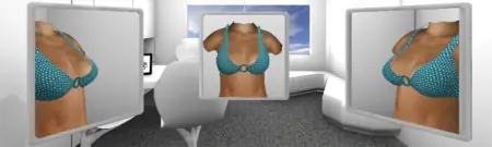 غرفة استشارة في Reflect Clinic مع شاشات محاكاة لتكبير الثدي
