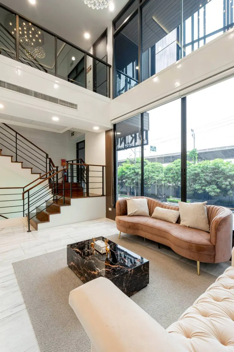 Modern waiting area at Dr.Nutt Clinic with large windows and stylish furniture