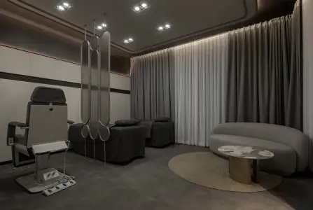 Modern patient treatment room at Forena Clinic with medical chair and beds