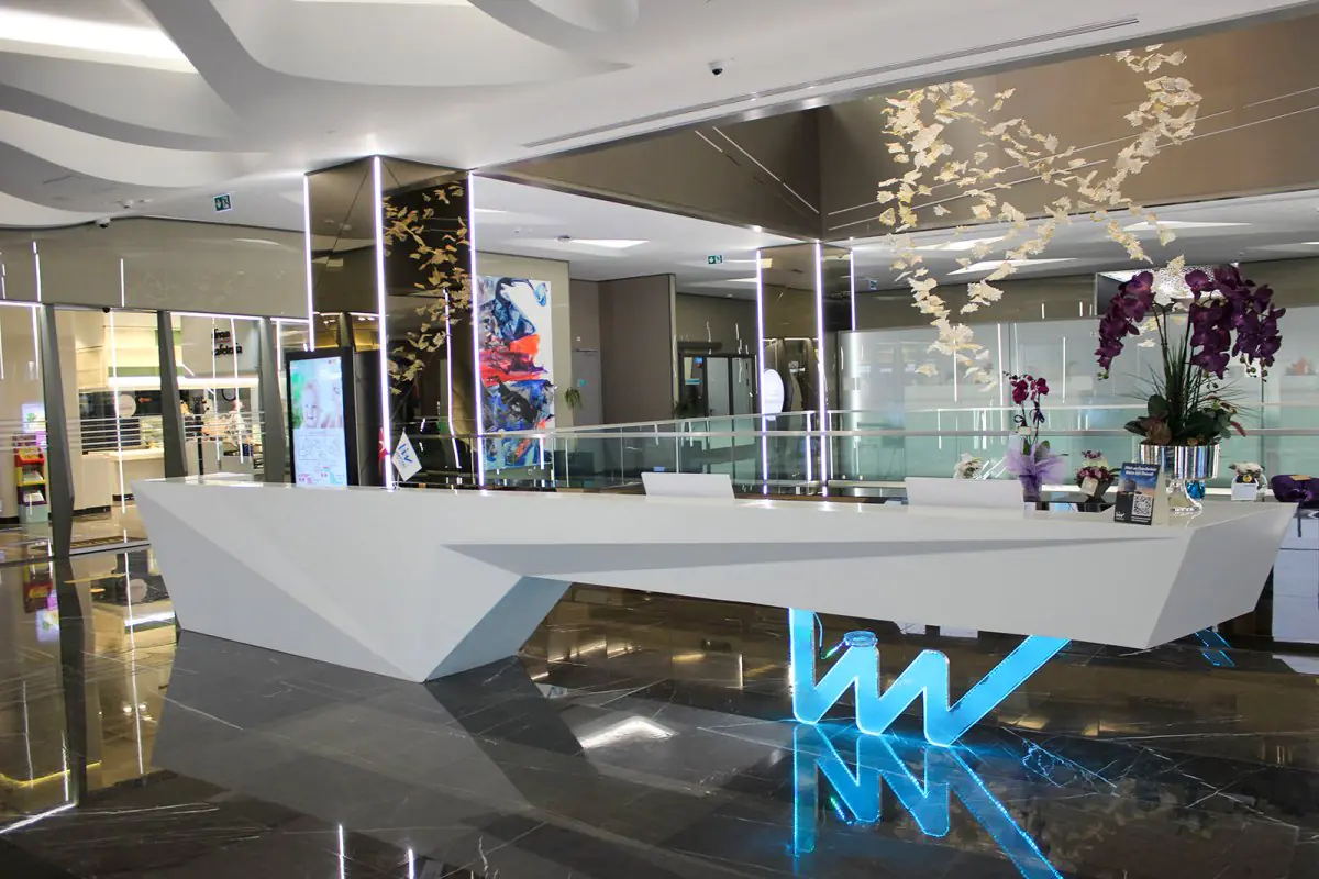 Reception desk at Liv Hospital Vadistanbul with modern design and floral decor