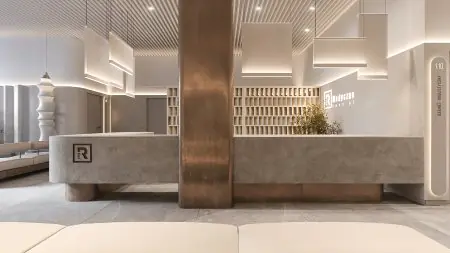 منطقة الاستقبال في عيادة RMED Kopernika في بولندا بتصميم حديث بسيط