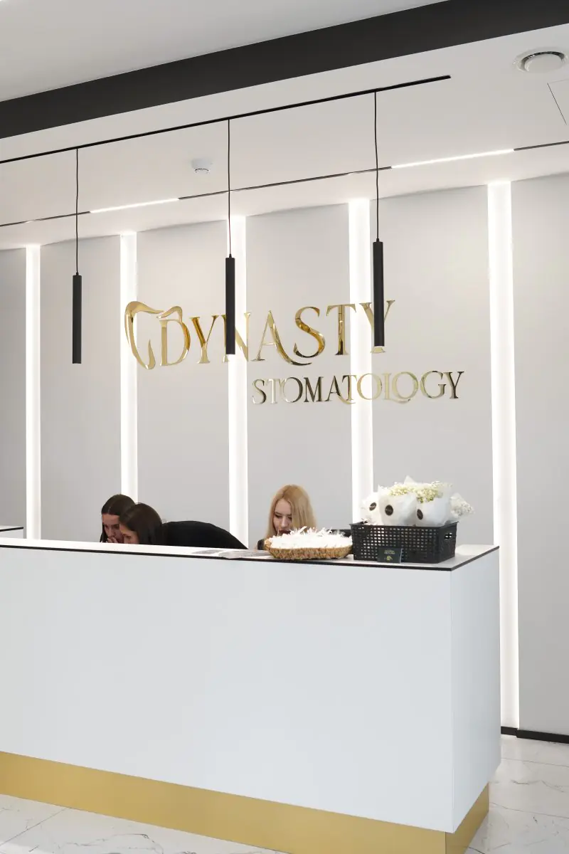 Reception desk at Dynasty Stomatology clinic in Prague with modern interior design