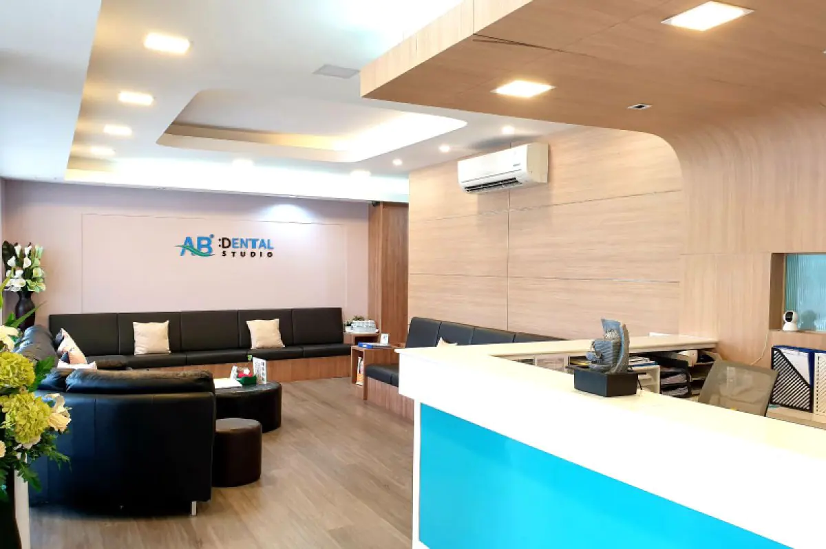 Reception area at A.B. Dental Studio Phuket with modern seating and welcoming decor