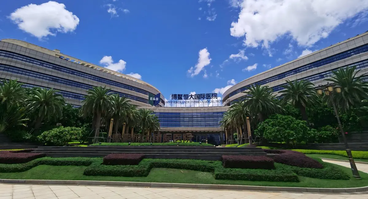 Boao International Medical Center modern clinic building with palm trees in Hainan, China