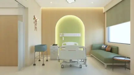 غرفة مرضى أطفال في Altrus HealthCare بسرير مستشفى وديكور مناسب للأطفال