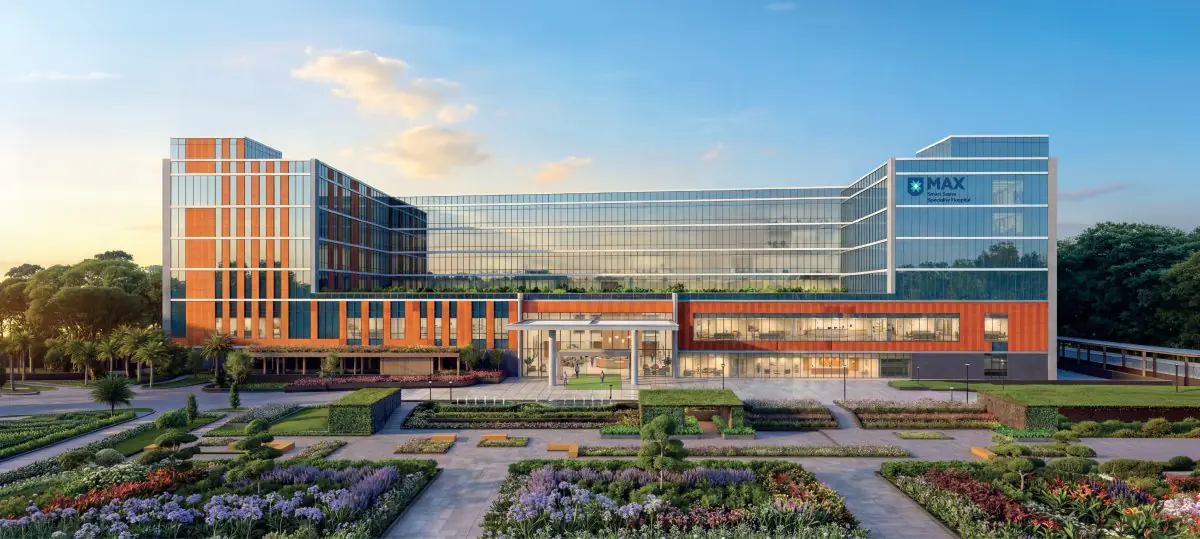 Modern facade of Max Smart Super Speciality Hospital with landscaped gardens