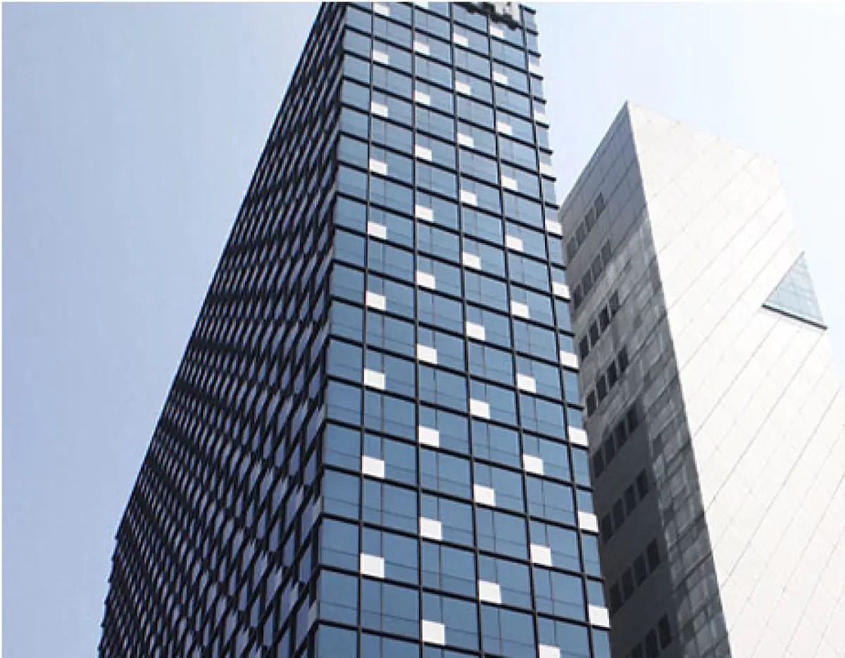 Umnagumo Plastic Surgery clinic exterior, modern glass building in South Korea