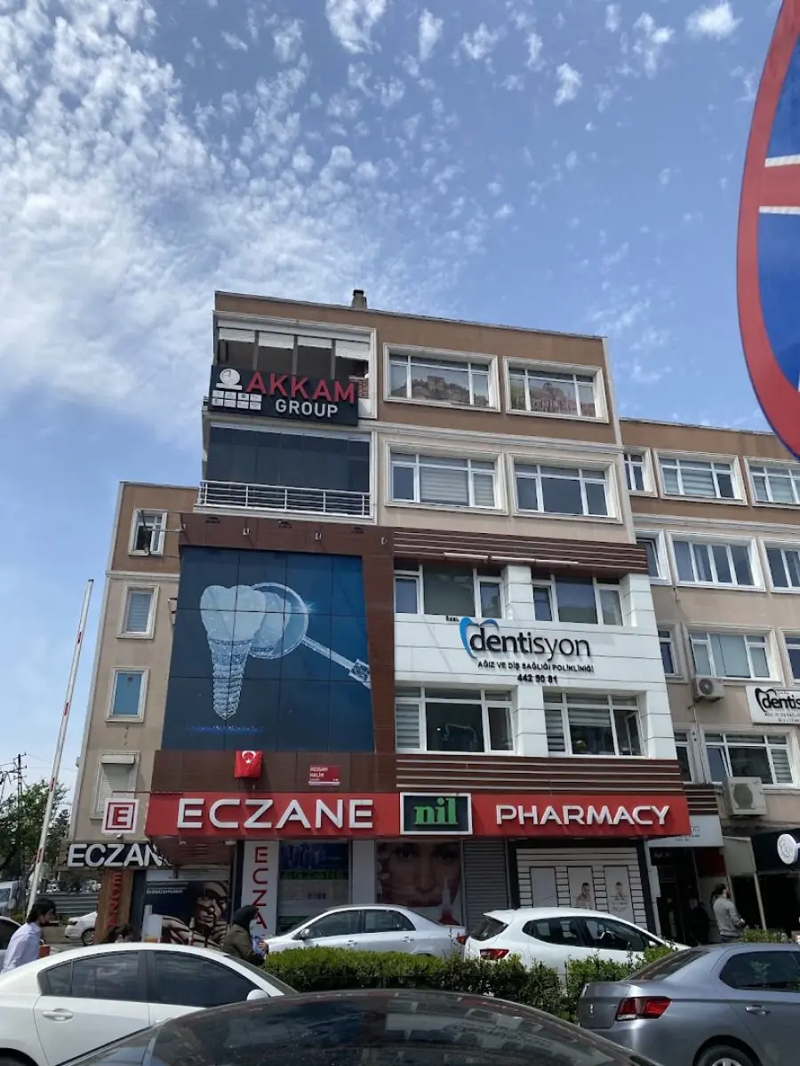 Dentisyon Ağız ve Diş Sağlığı Polikliniği clinic exterior in Turkey with dental signage