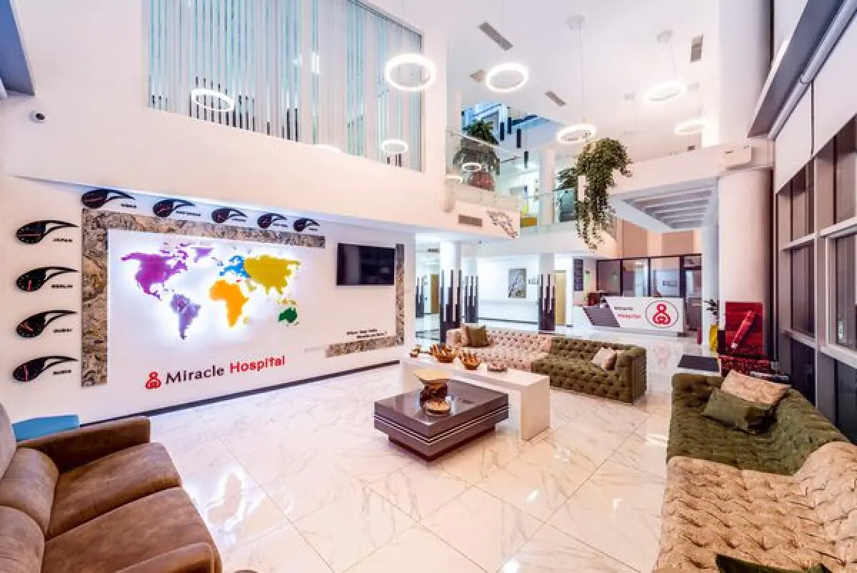 Reception and waiting area at Miracle IVF Cyprus with modern decor and world map wall