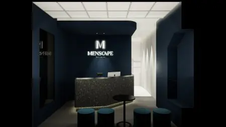 منطقة الاستقبال في عيادة Menscape بتصميم داخلي أزرق داكن حديث