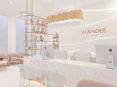 منطقة الاستقبال في عيادة واندي بتصميم رخامي حديث وديكور أنيق
