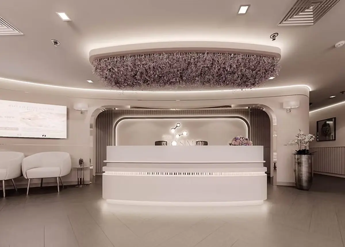 Reception area at The Cosmo Clinic with modern decor and elegant lighting