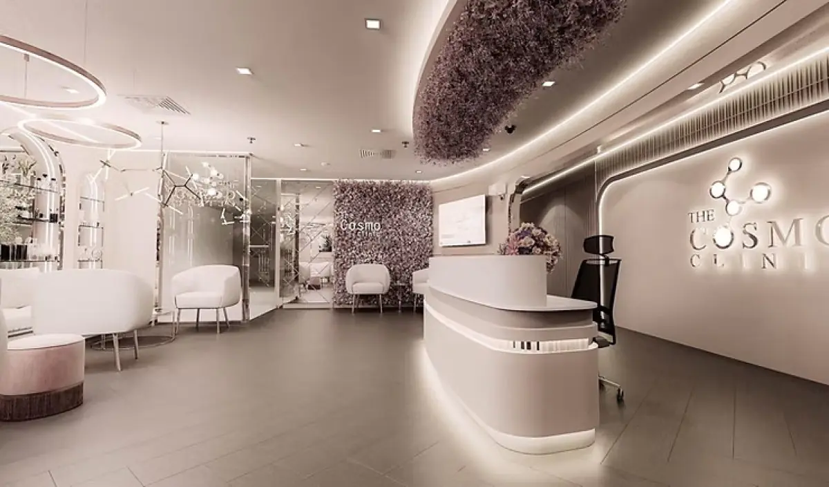 Reception area at The Cosmo Clinic with modern decor and patient seating