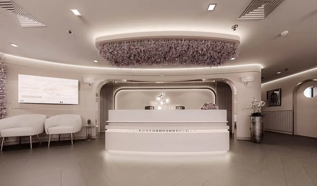 Reception area at The Cosmo Clinic with modern decor and comfortable seating