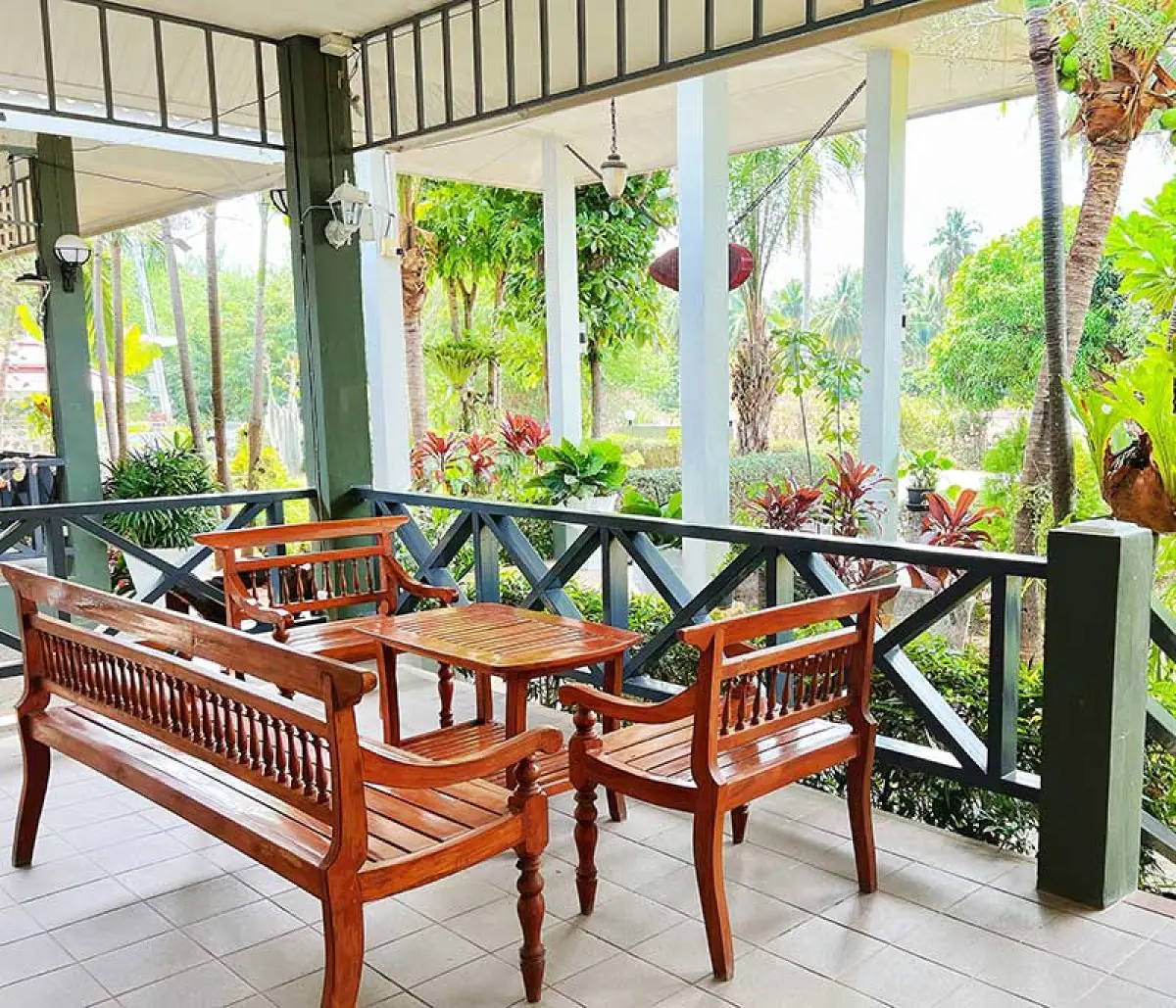 Outdoor patient lounge at SafeHouse Rehab Thailand with garden view