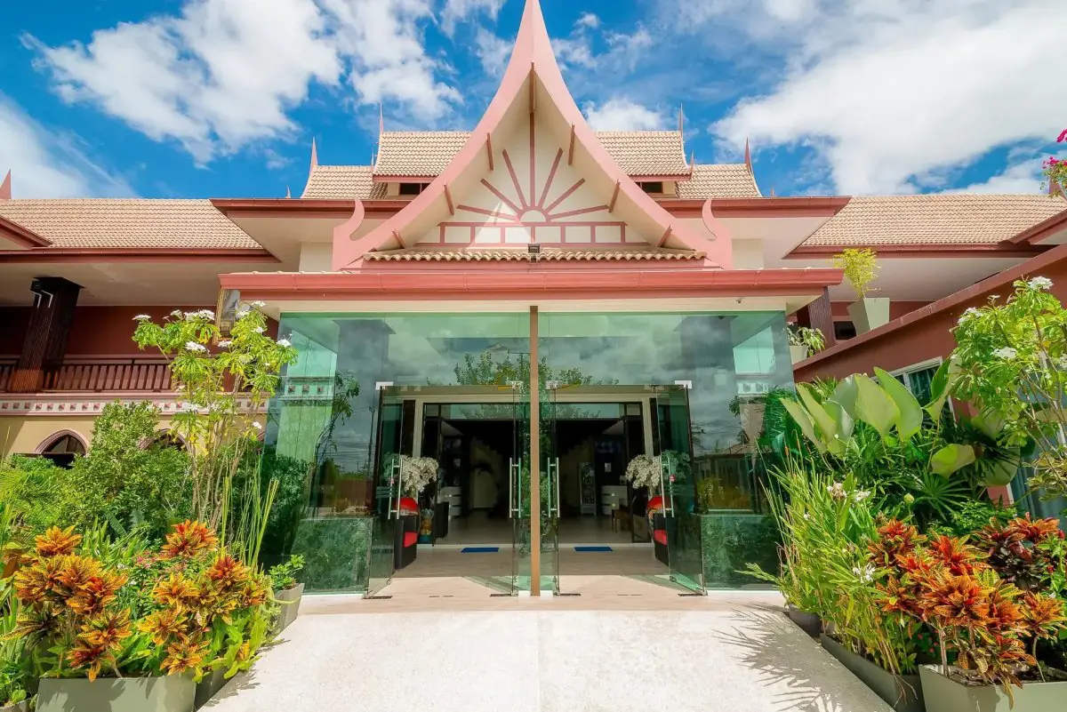 Phufa Resthome clinic exterior with Thai architectural design and lush garden