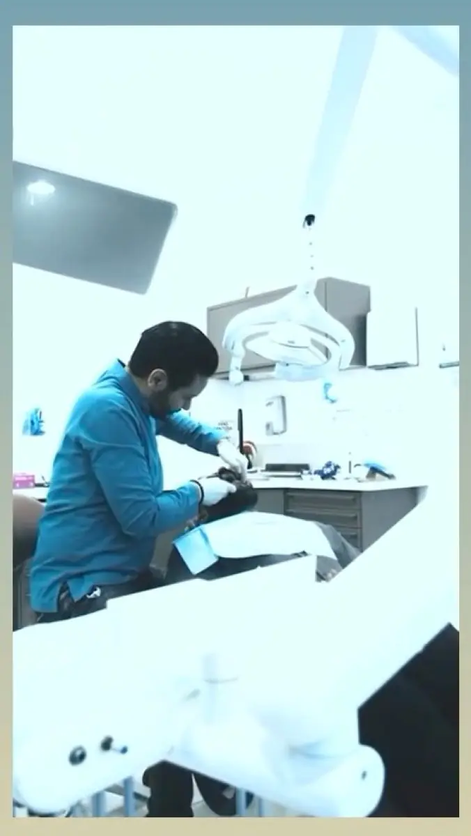 Dental treatment room at Enfield Royal Clinic Dubai with dentist and modern equipment