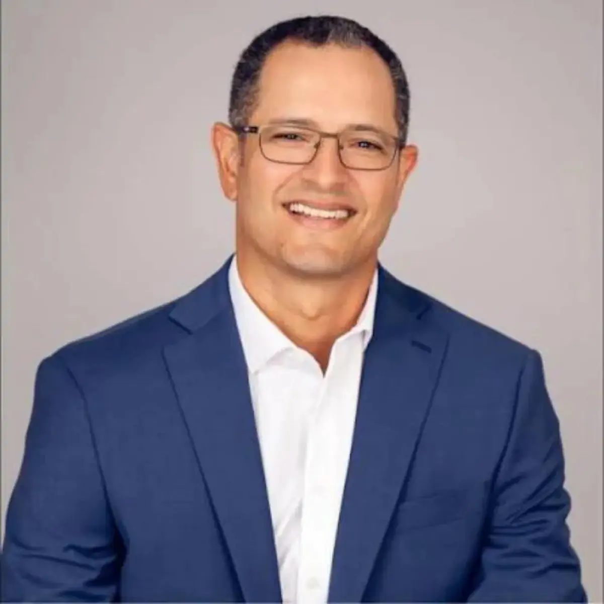 Male doctor in blue suit at South Florida Bariatrics clinic