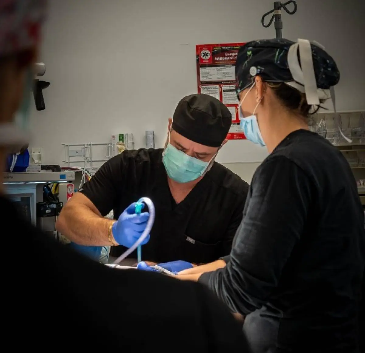 Doctors performing surgery in operating room at Doctor Rodriguez clinic