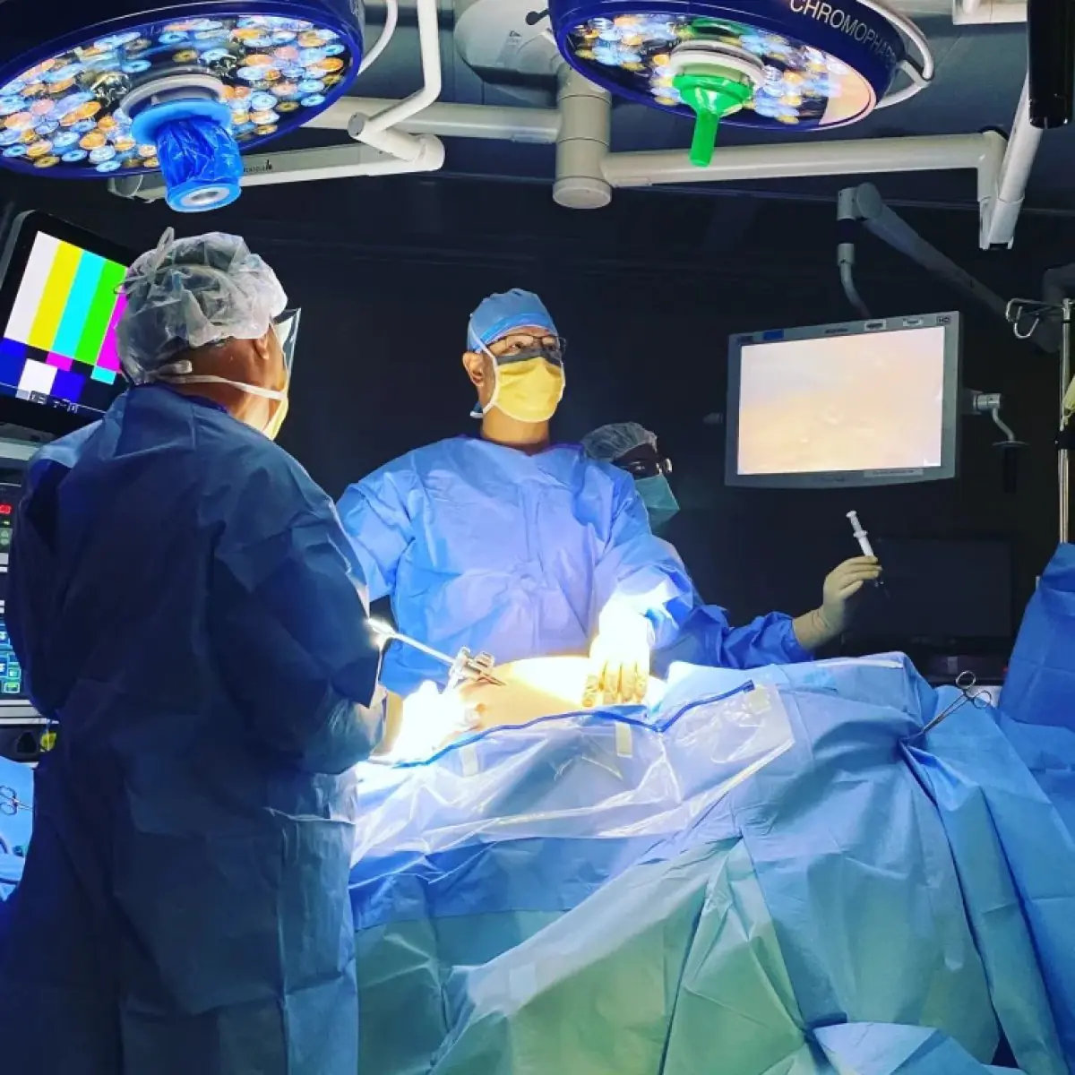 Modern operating room at Doctor Rodriguez clinic with surgical team and advanced equipment