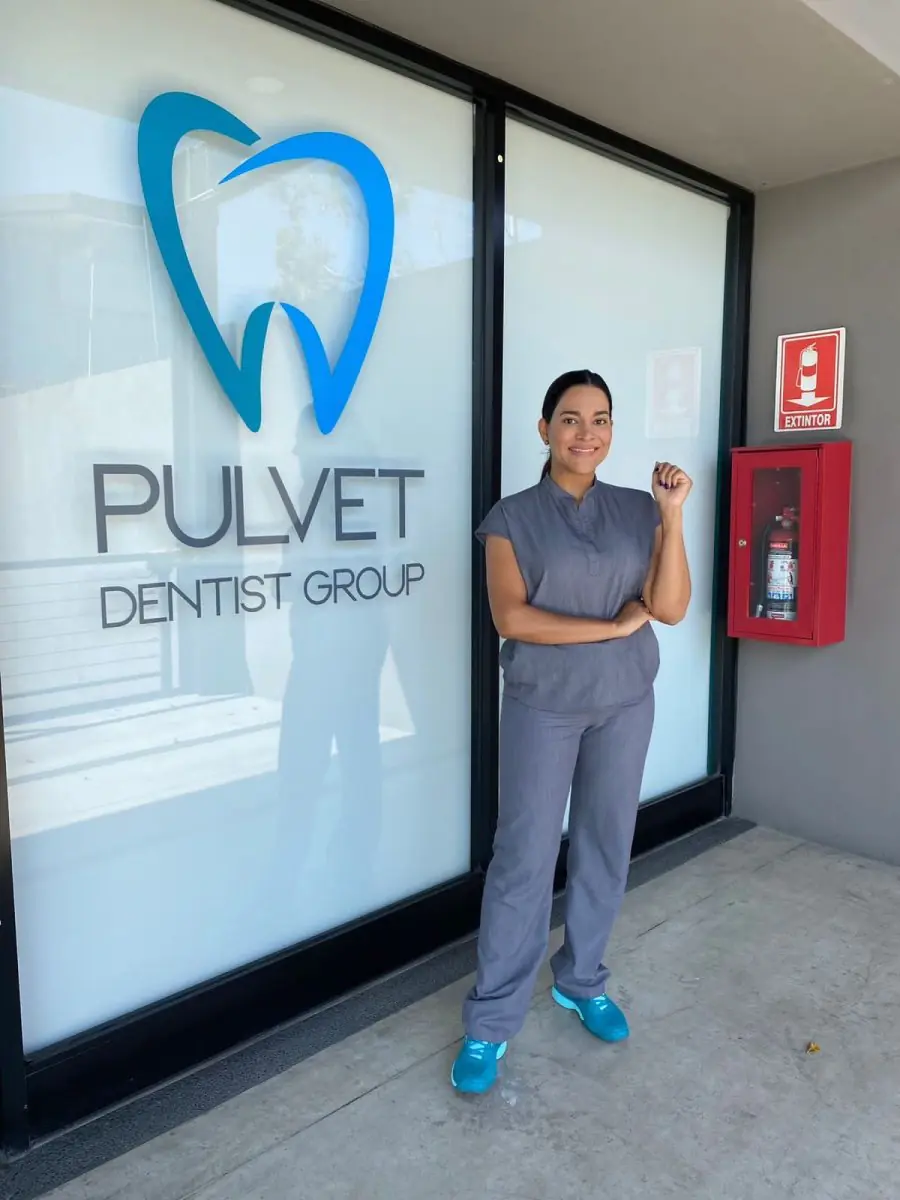 Pulvet Dentist Group clinic entrance with staff member in uniform