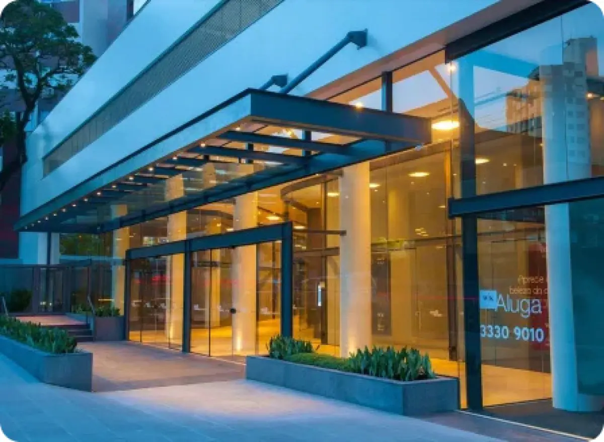 Modern clinic exterior of Dr. Henrique Reis, glass facade in Brazil