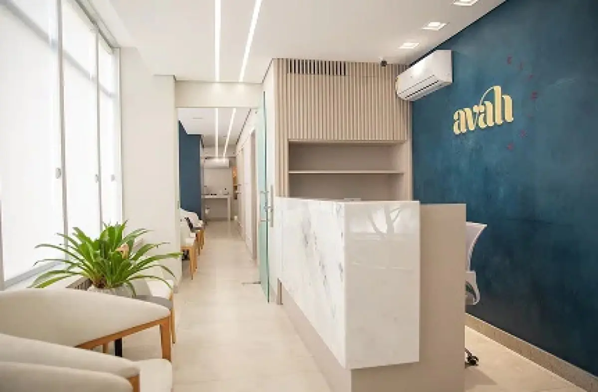 Reception area at Avah Clinic with modern decor and comfortable seating