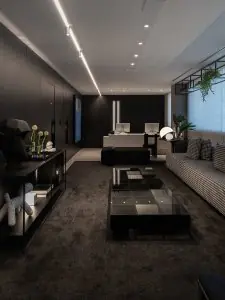 Recepción moderna en la clínica Sollos con interior negro elegante y sala de espera