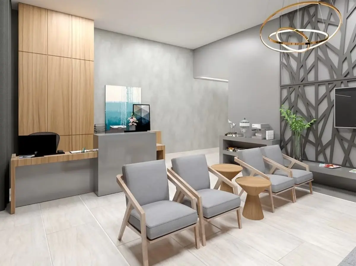 Modern reception and waiting area at Dr. Rogério Matoso clinic with comfortable seating