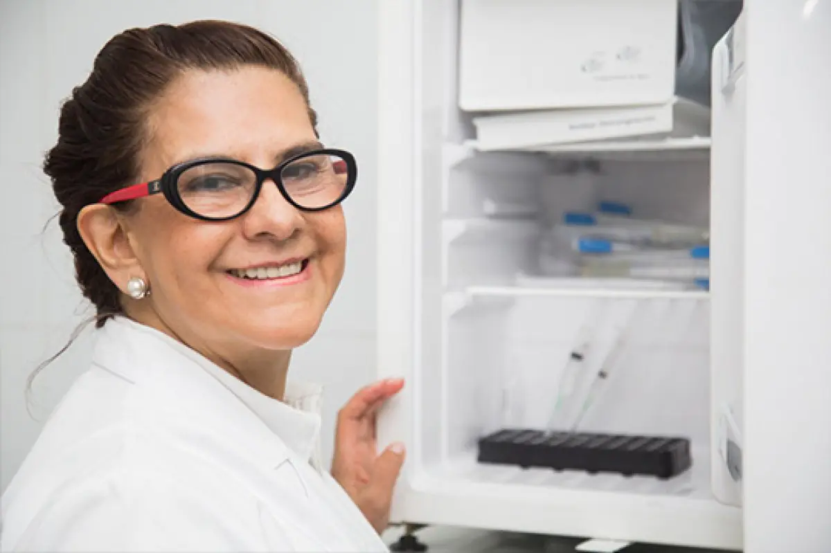 Laboratory staff at Nexus Group I.P.S with medical samples in clinic refrigerator