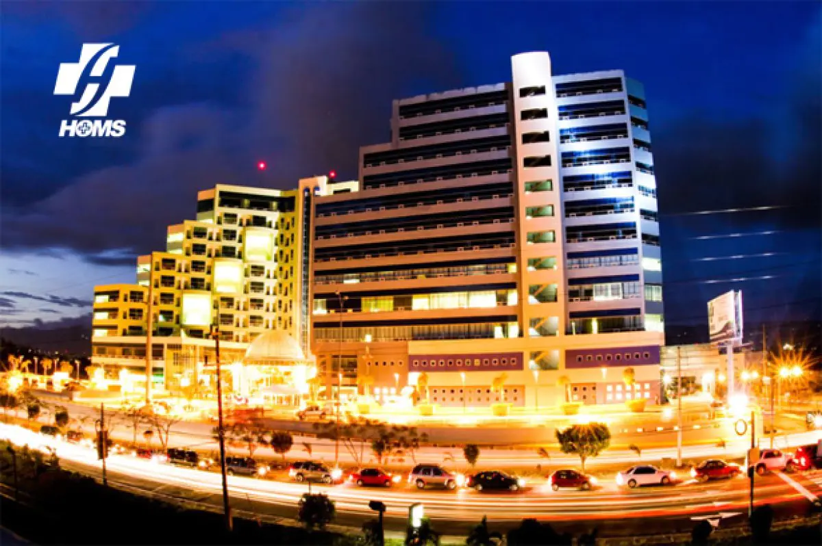 HOMS Hospital exterior at night in Santiago, modern medical facility in Dominican Republic