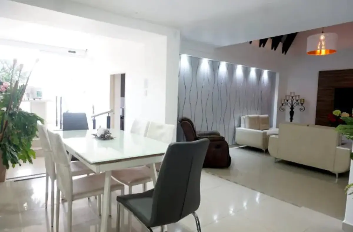 Modern waiting area at Dr. Carlos Velasco Clinic with comfortable seating