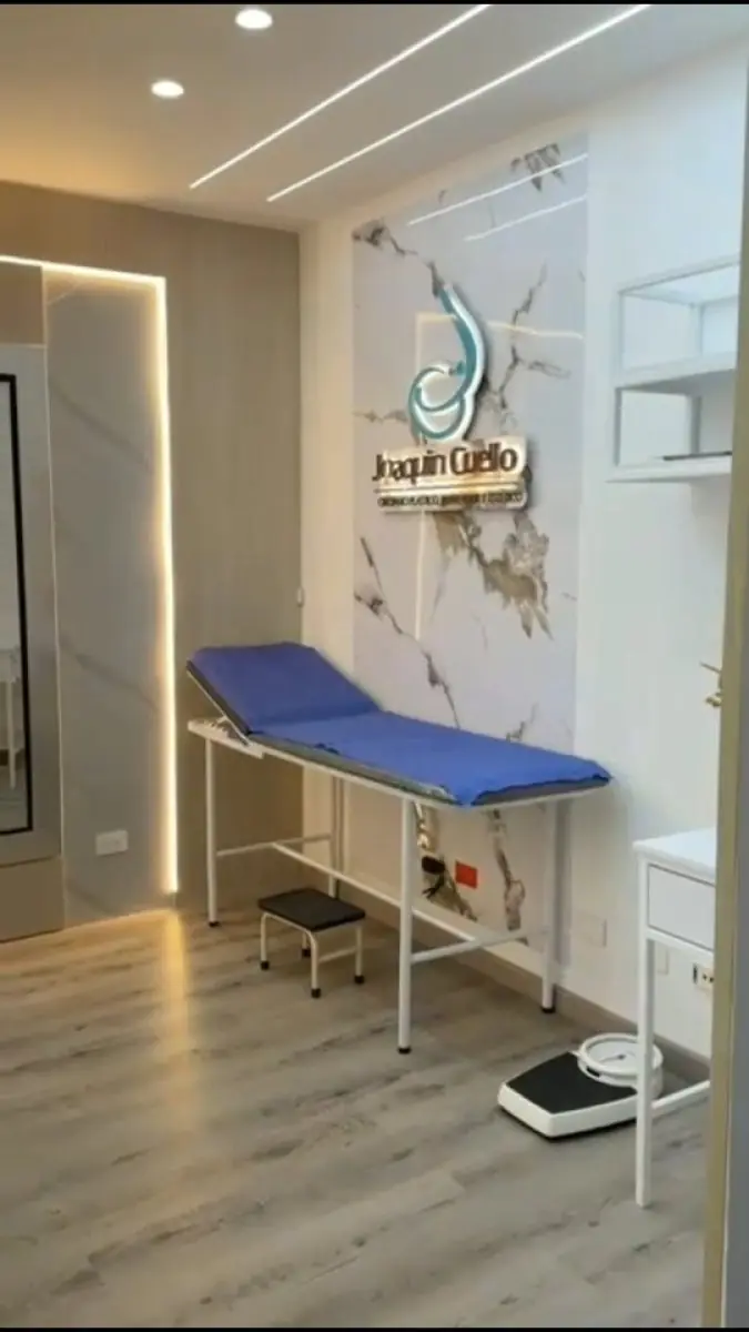 Examination room at Dr. Joaquín Cuello Clinic with modern medical equipment