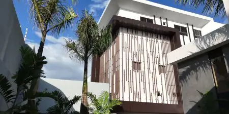الواجهة الحديثة لعيادة Imperial Health Clinic مع أشجار النخيل وتصميم عصري