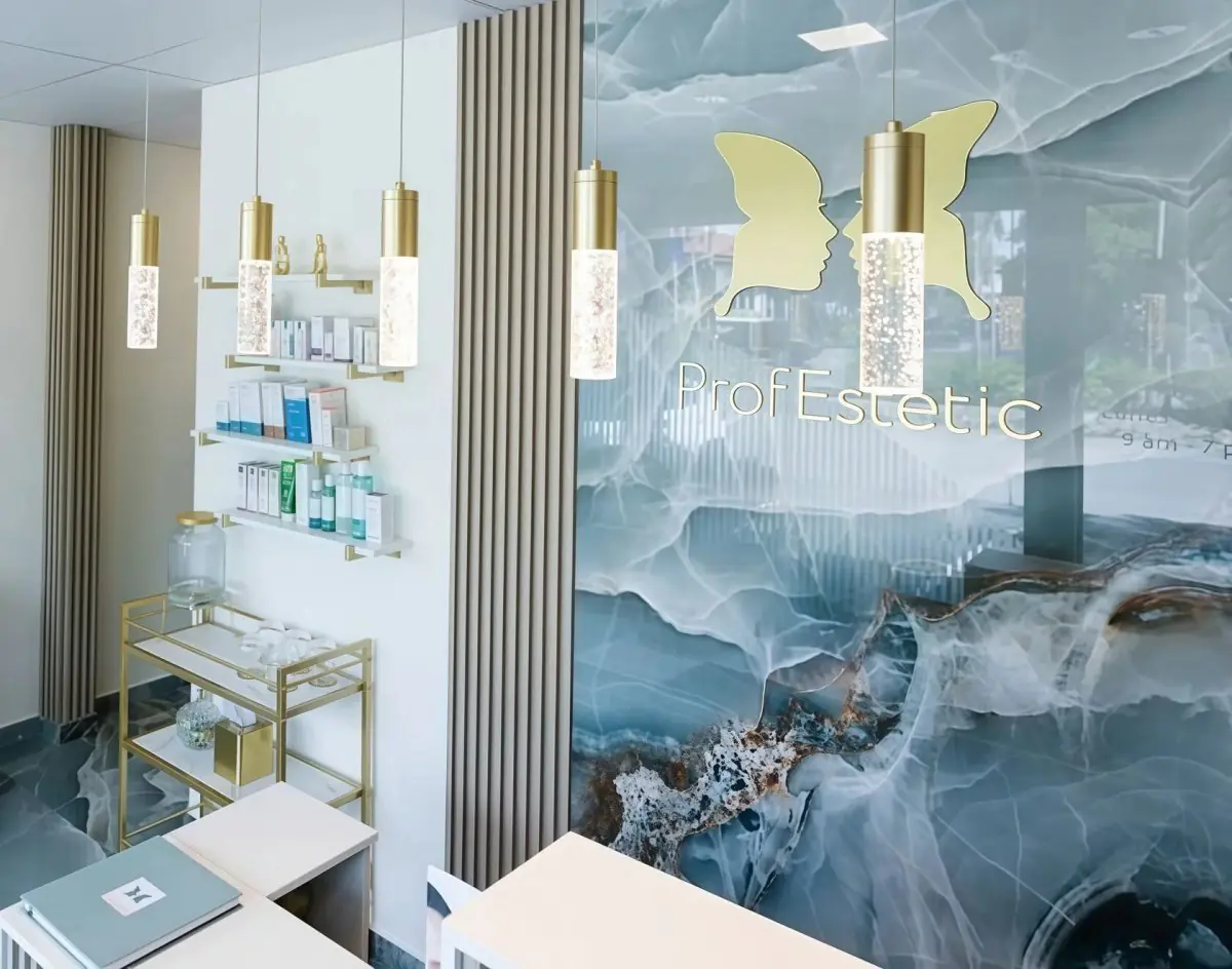 Reception area at ProfEstetic clinic with modern decor and skincare products