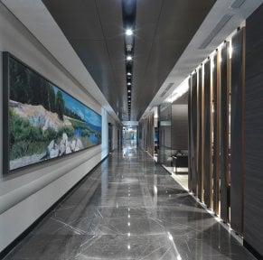 Modern clinic hallway at Bookimed with marble floors and contemporary interior design
