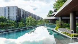 Sanpiti Rehabilitation Center outdoor pool area with modern facilities and lush greenery