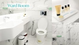 Modern ward room bathroom at Wansiri Hospital with amenities and clean marble design