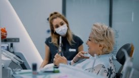 No prep veneers result at Nifa Dent International – patient smiling after dental procedure